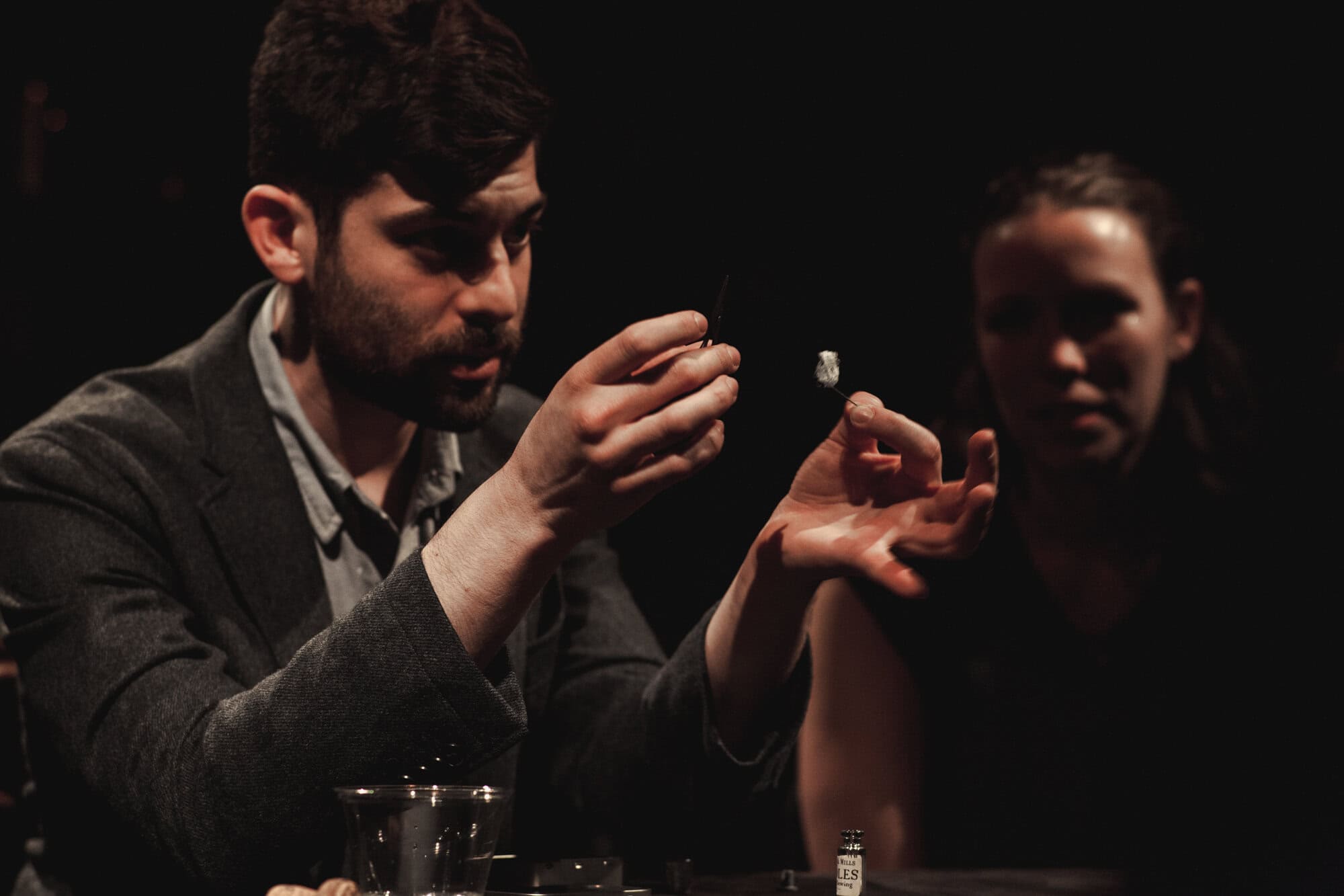 Magician performing close-up magic at a New York event